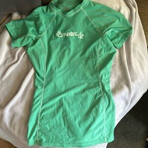 Green O’Neil rash guard.